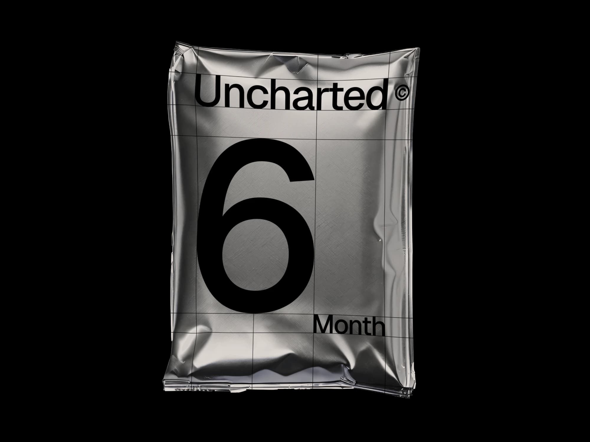 A silver foil pack printed with Uncharted, a large 6 and the word Month