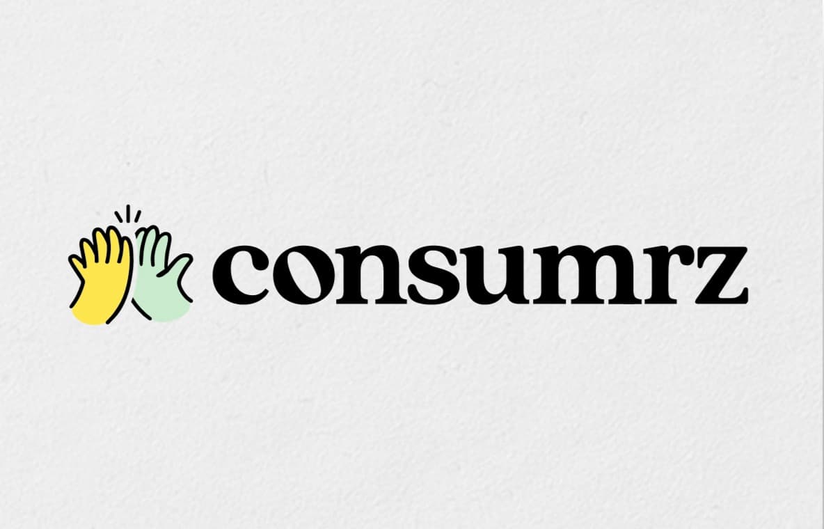 The Consumrz high-five mark and wordmark printed on textured paper