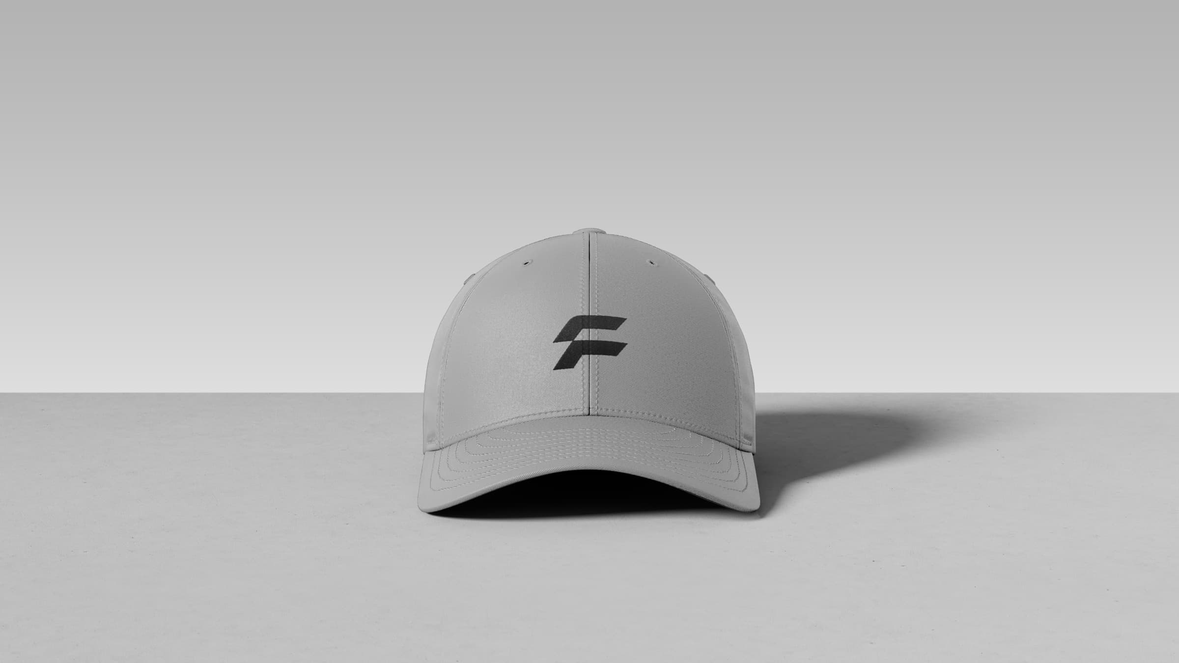 A grey cap embroidered with the FLX Sports F mark