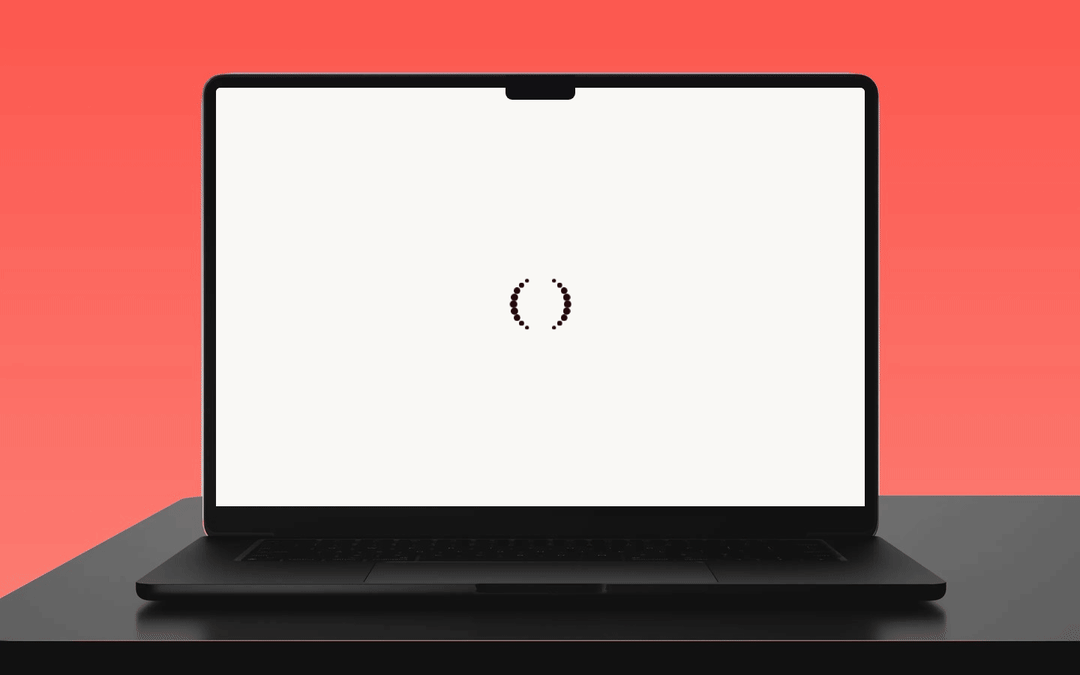 A laptop on Passion red showing the Dova mark as a loading state, before the clinic dashboard appears